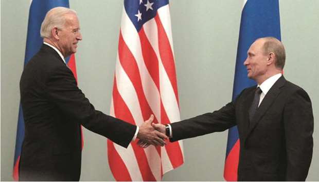 (File photo) Russian President Vladimir Putin (right) and US President Joe Biden.