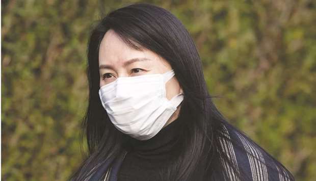 Meng Wanzhou, CFO of Huawei Technologies, leaves her home to attend Supreme Court in Vancouver on March 1. Meng is fighting extradition to the US where she faces charges of bank fraud and conspiracy related to a Huawei subsidiaryu2019s alleged violations of US sanctions on Iran.