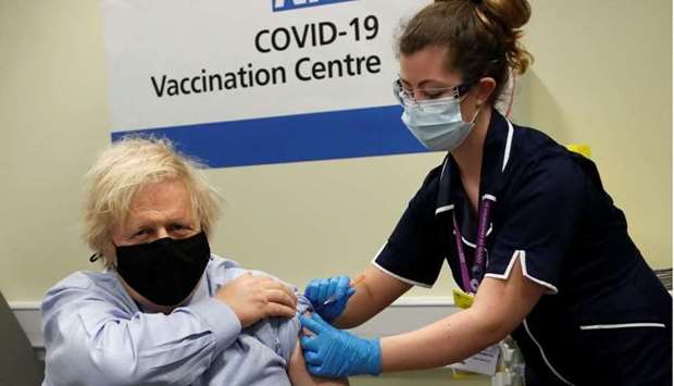 British Prime Minister Boris Johnson receives a dose of the Oxford/AstraZeneca Covid-19 vaccine, amid the coronavirus disease pandemic, in London, Britain