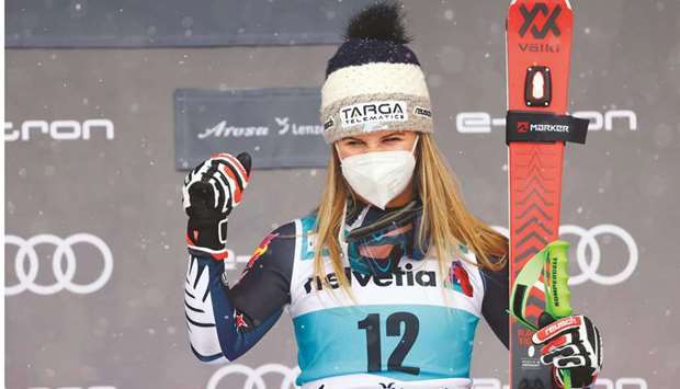New Zealandu2019s Alice Robinson celebrates first place in the Womenu2019s Giant Slalom on the podium of the World Cup Finals in Lenzerheide, Switzerland, yesterday. (Reuters)