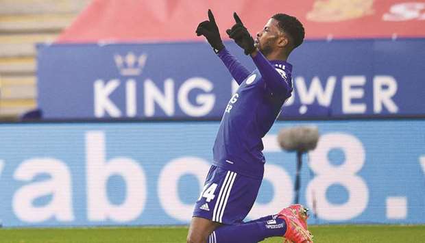 Leicester Cityu2019s Kelechi Iheanacho celebrates after scoring the opening goal of the FA Cup quarter-final against Manchester United in Leicester yesterday. (AFP)