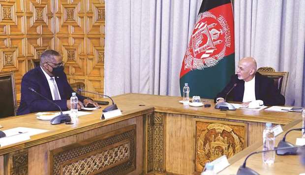 Afghan President Ghani is seen with US Defence Secretary Austin during their meeting in Kabul yesterday.