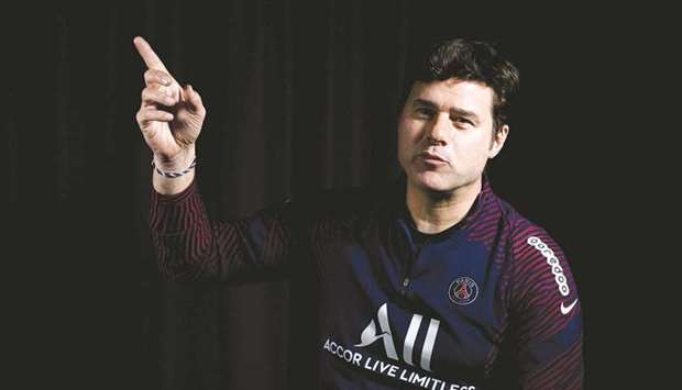 Paris Saint-Germainu2019s Argentinian head coach Mauricio Pochettino poses at the teamu2019s training grounds in Saint-Germain-en-Laye, outside Paris, on Monday.