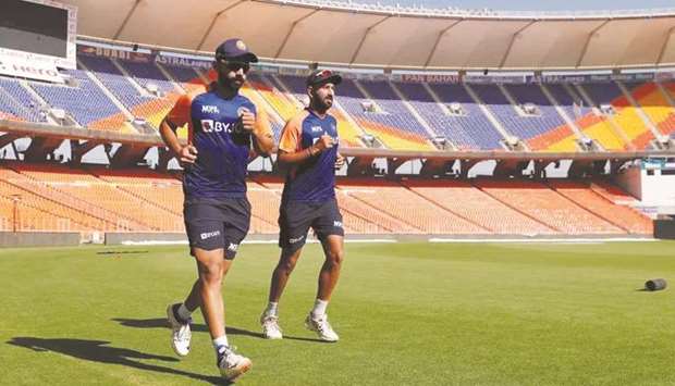 Indian batsmen Ajinkya Rahane (left) and Cheteshwar Pujara train in Ahmedabad yesterday.
