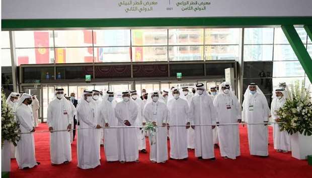 HE the Minister of Municipality and Environment Abdullah bin Abdulaziz bin Turki al-Subaie and other dignitaries cut a ribbon to mark the opening of Qatar's Eighth International Agricultural Exhibition (AgriteQ) and the Second Qatar International Environmental Exhibition (EnviroteQ), at the Doha Exhibition and Convention Center (DECC) Tuesday.