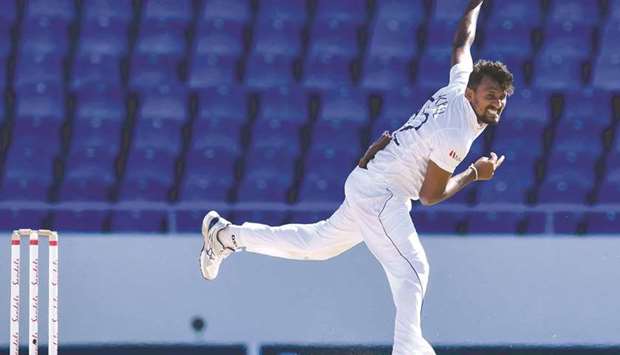 Suranga Lakmal of Sri Lanka bowls during Day 2 of the 1st Test against West Indies at Vivian Richards Cricket Stadium in North Sound, Antigua and Barbuda. (AFP)