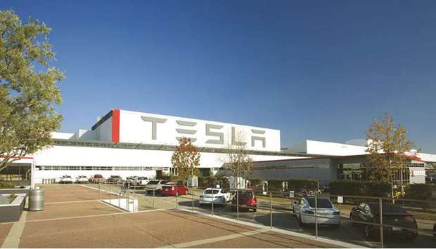The Tesla factory in Fremont, California. The future of the auto industry in America will be largely determined by a parade of new electric trucks u2013 at least four from Detroit incumbents facing off against at least six from Tesla and other upstarts.