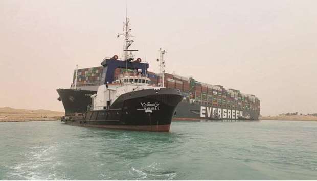 A container ship which was hit by strong wind and ran aground is pictured in Suez Canal, Egypt yesterday. While the vessel is only likely to remain stuck for a couple of days, thatu2019ll be long enough to scramble some energy flows, creating an extra headache for refiners, traders and producers already coping with the pandemicu2019s fallout. Local pipeline networks, however, should help to alleviate some of the disruption.
