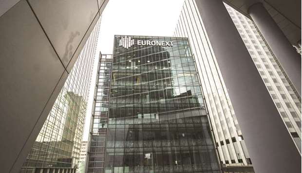 The Euronext logo sits on the exterior of the Paris Stock Exchange in La Defense business district. The CAC 40 closed less than 0.1% up at 5,942.41 points yesterday.