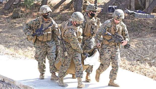 US Army soldiers and South Korean marines take part in a joint military exercise in Pohang, South Korea, yesterday.