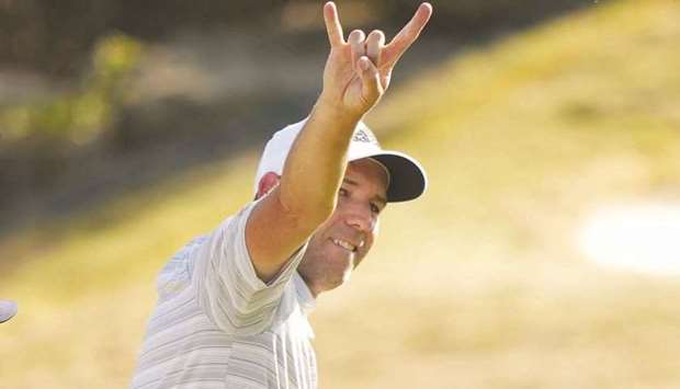 Sergio Garcia of Spain celebrates after hitting a hole in one on the fourth playoff hole in his playoff match against Lee Westwood of England during the third round of the World Golf Championships-Dell Technologies Match Play at Austin Country Club on March 26, 2021 in Austin, Texas.
