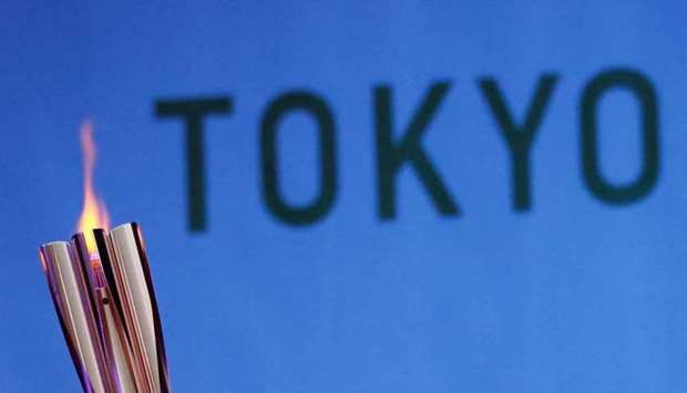 The Olympic torch is seen at Hibarigahara Festival Site, during the last leg of the first day of the Tokyo 2020 Olympic torch relay, in Minamisoma, Fukushima prefecture, Japan on March 25