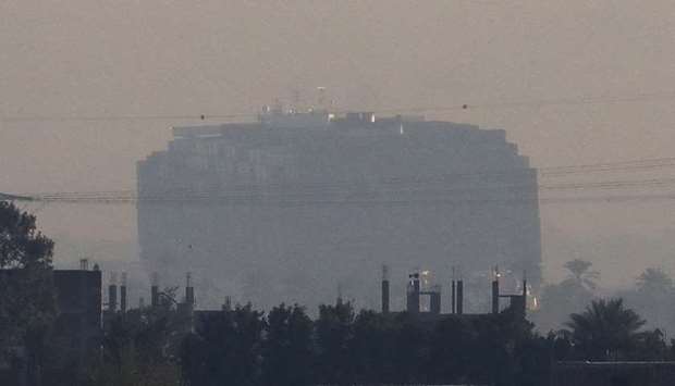 A view shows the container ship Ever Given, one of the world's largest container ships, in Suez Canal, Egypt