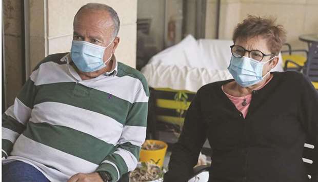 Retired private sector teachers Fouad and Sara Ammar speak about their situation amid the countryu2019s economic crisis during an interview at their residence in the Lebanese capital Beirut.