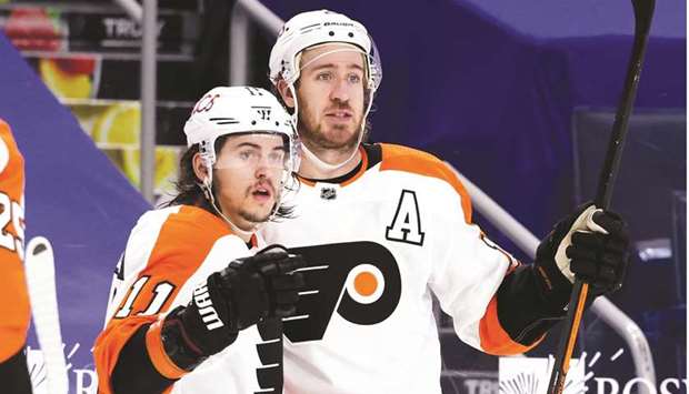 Philadelphia Flyers center Kevin Hayes (right) celebrates with right wing Travis Konecny after scoring a goal against the Buffalo Sabres during the third period at KeyBank Center in Buffalo, New York. (USA TODAY Sports)