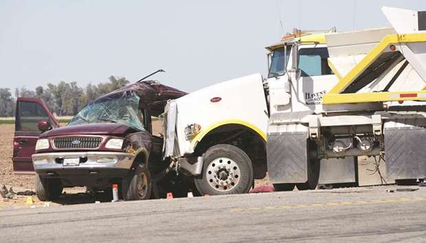 The scene of the collision between the sport utility vehicle (SUV) and a tractor-trailer truck near Holtville, California, US.