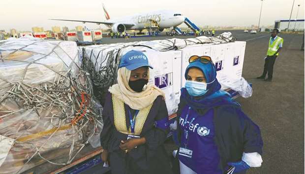 United Nations International Childrenu2019s Emergency Fund (Unicef) supervises the arrival of the first batch of coronavirus vaccines, at Khartoum airport in the Sudanese capital, yesterday.