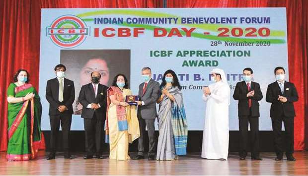 BPQ's two-time president Jayati B Maitra receives the ICBF Appreciation Award from Indian ambassador