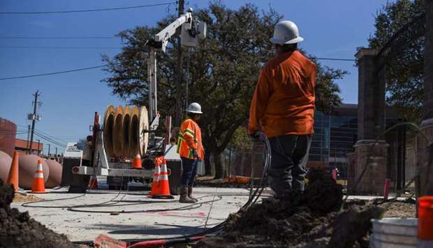 A crew works to restore 5G following an unprecedented winter storm in Houston.
