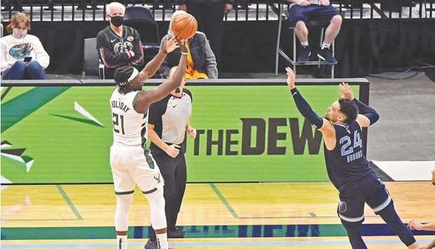 Jrue Holiday of the Milwaukee Bucks shoots the game winning shot against Dillon Brooks of the Memphis Grizzlies during the second half at FedExForum in Memphis, Tennessee. (Getty Images/AFP)
