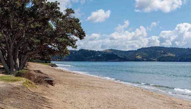 A deserted beach is pictured following a tsunami warning in Orewa, north of Auckland