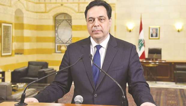 Lebanonu2019s caretaker Prime Minister Hassan Diab speaks at the government palace in Beirut, yesterday.