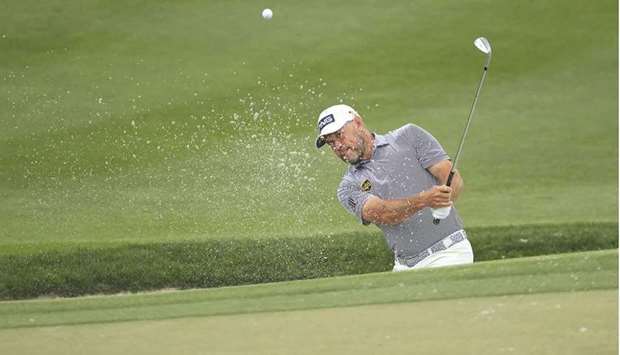 Lee Westwood of England plays a second shot on the second hole during the third round of the Arnold Palmer Invitational Presented by MasterCard at the Bay Hill Club and Lodge in Orlando, Florida. (Getty Images/AFP)