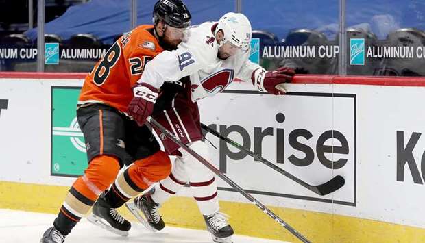 Jani Hakanpaa (left) of the Anaheim Ducks fights on the boards against Nazem Kadri of the Colorado Avalanche in the second period at Ball Arena in Denver, Colorado. (Getty Images/AFP)