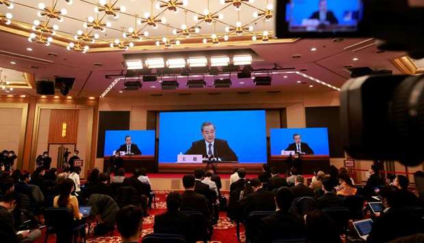 Chinese State Councillor and Foreign Minister Wang Yi is seen via video link at a news conference on the sidelines of the National Peopleu2019s Congress (NPC), in Beijing.