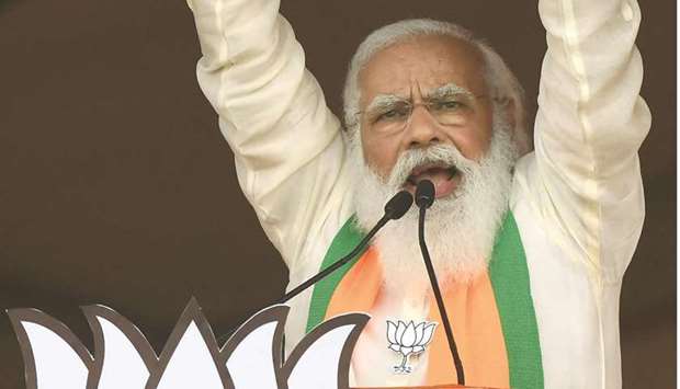 Indiau2019s Prime Minster Narendra Modi addresses supporters of the Bharatiya Janata Party (BJP) during a mass rally ahead of the state legislative assembly elections at the Brigade Parade ground in Kolkata yesterday.