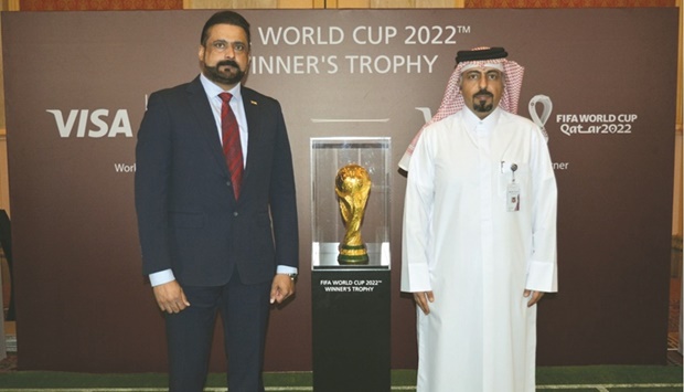Officials with the trophy at the exclusive event.