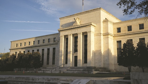 The Federal Reserve building in Washington, DC. Fed officials next week will raise interest rates for the first time since 2018 and signal a faster pace of hikes in 2022, according to economists surveyed by Bloomberg, though they may be cautious amid uncertainty due to Russiau2019s invasion of Ukraine.