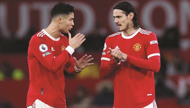 Manchester United forwards Cristiano Ronaldo (left) and Edinson Cavani are fit and available for todayu2019s Premier League game at home to Tottenham Hotspur. (Reuters)