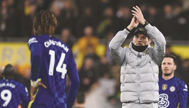 Chelseau2019s German head coach Thomas Tuchel applauds as he celebrates after his teamu2019s 3-1 win over Norwich City in the Premier League at Carrow Road Stadium in Norwich, eastern England, on Thursday night. (AFP)
