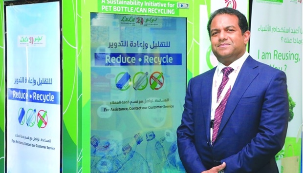 Dr Althaf with LuLu's 'reduce.recycle' machine at AgriteQ 2022.