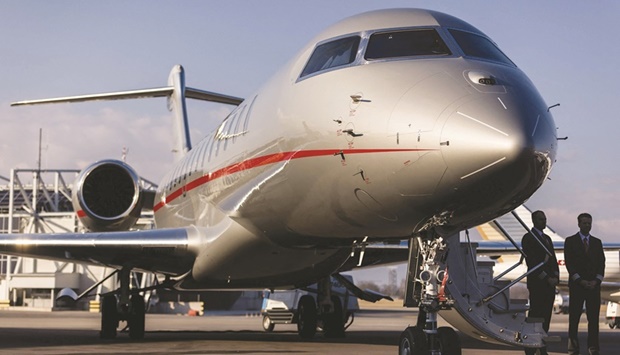 A Bombardier Global 7500 business jet is seen during a presentation of the brand new aircraft from the global business aviation company at Geneva airport on March 3. Airlines may find themselves swept up in unprecedented turbulence, with air travel shunned over climate concerns, plagued by pandemic shutdowns and soaring oil prices, but for private jet operators, business is booming.