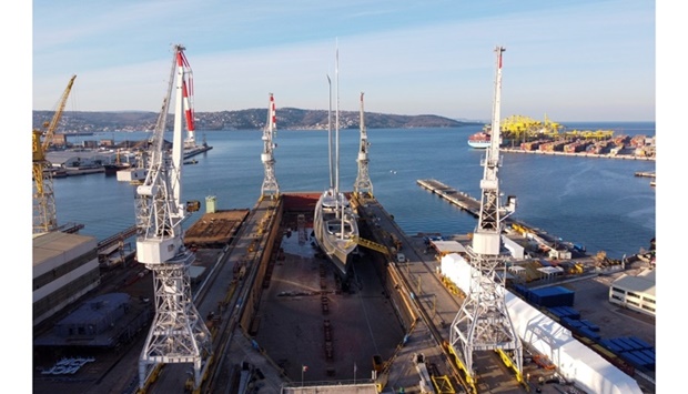 The superyacht from Russian billionaire Andrey Igorevich Melnichenko which has been sequestered by Italian Finance police is seen at the northern port of Trieste, Italy, March 12. Picture taken with a drone. REUTERS/Giorgio Boemo