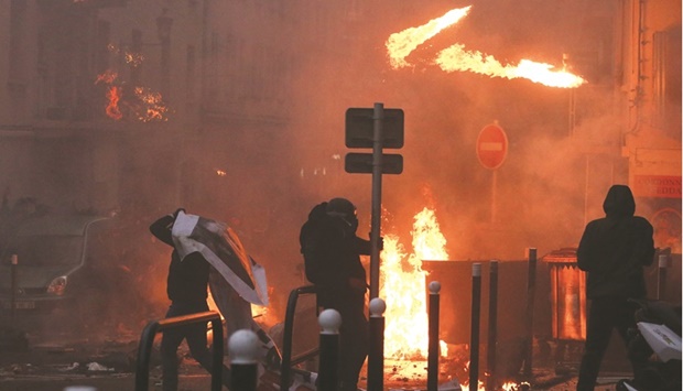 Protesters clash with police in Bastia following a rally in homage to the pro-independence activist Yvan Colonna who was assaulted in the prison of Arles. (AFP)