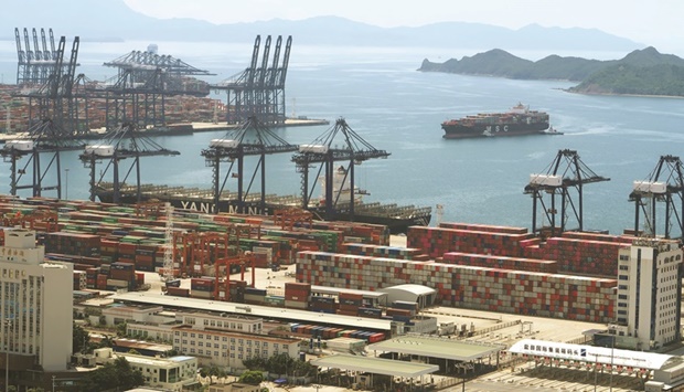A cargo ship carrying containers is seen near the Yantian port in Shenzhen. Chinau2019s economy perked up in the first two months of 2022, with key indicators all exceeding analystsu2019 expectations, although a surge in Omicron cases, property weakness and heightened global uncertainties are weighing on the outlook.