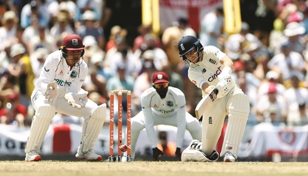 Englandu2019s Joe Root in action against West Indies on the first day of the second Test at the Kensington Oval, Bridgetown, Barbados, yesterday. (Reuters)