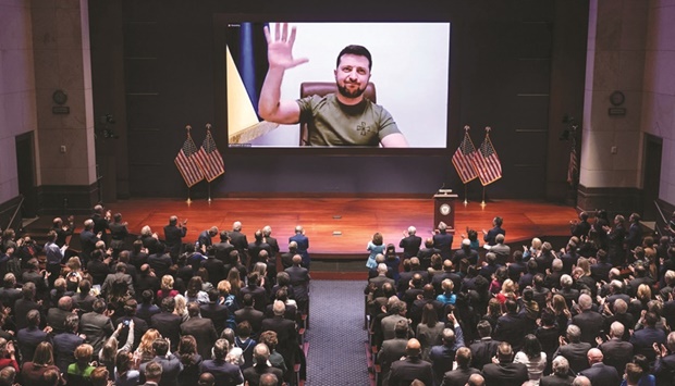Ukrainian President Volodymyr Zelensky virtually addressing the US Congress yesterday at the US Capitol Visitor Center Congressional Auditorium, in Washington, DC. (AFP)