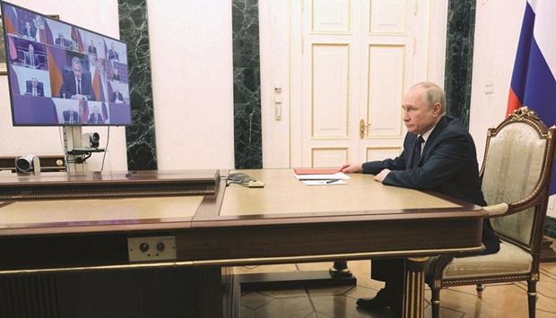 Russian President Vladimir Putin chairs a meeting with members of the Security Council via a video link at the Kremlin in Moscow. (Reuters file photo)