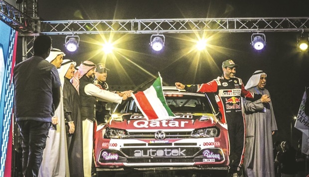Qataru2019s Nasser Saleh al-Attiyah and his French co-driver Mathieu Baumel at the ceremonial ceremony of Kuwait International Rally on Thursday.