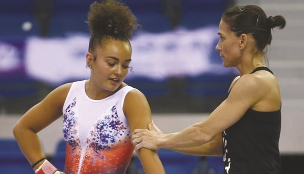 Uzbekistanu2019s veteran gymnast Oksana Chusovitina (right) during the 4th Artistic Gymnastics World Cup at the Aspire Dome yesterday.