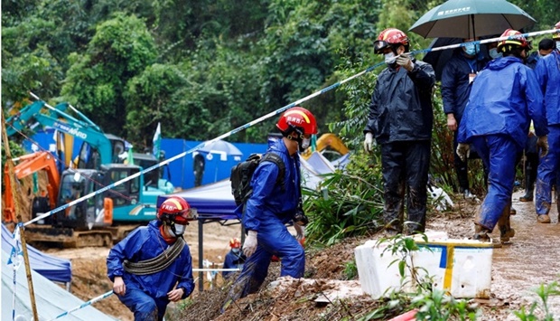 Rescue workers work at the site where a China Eastern Airlines Boeing 737-800 plane flying from Kunming to Guangzhou crashed, in Wuzhou, Guangxi Zhuang Autonomous Region, China on March 24. REUTERS