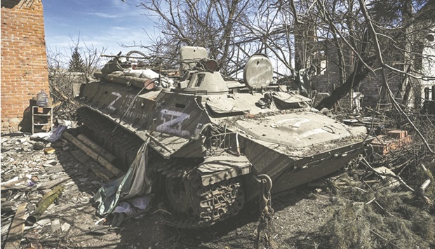 An abandoned Russian armoured vehicle in the village of Mala Rogan, east of Kharkiv, in Ukraine. (AFP)