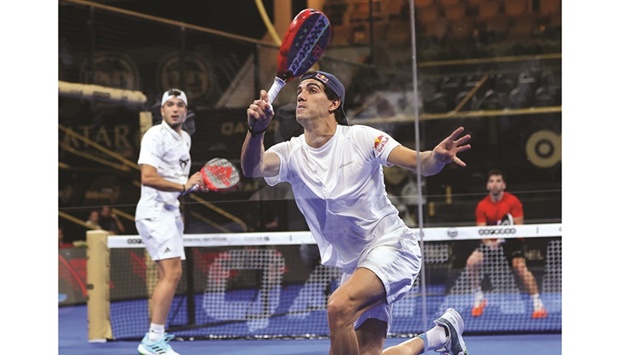 Spainu2019s Juan Lebron (right) and Alejandro Galan in action during the Ooredoo Qatar Major 2022 padel championship at the Khalifa International Tennis Complex on Wednesday.