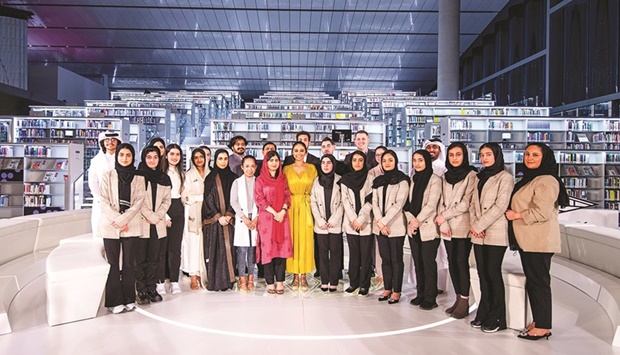 Education activist and Nobel Peace Prize laureate Malala Yousafzai and Doha Debates correspondent Nelufar Hedayat with the students who participated in the discussion.