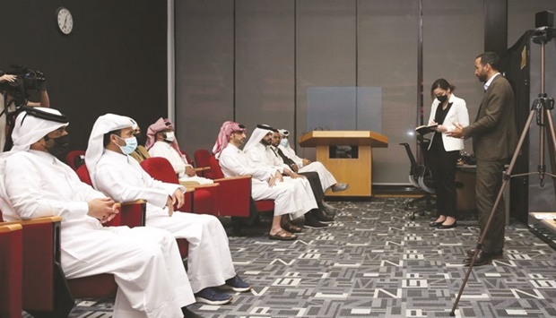 Labour inspectors attend training session.