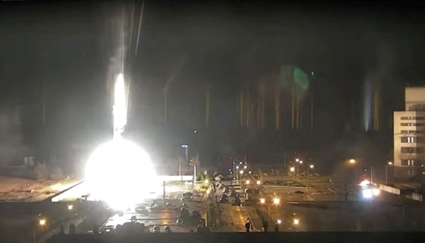 Surveillance camera footage shows a flare landing at the Zaporizhzhia nuclear power plant during shelling in Enerhodar, Zaporizhia Oblast, Ukraine, in this screengrab from a video obtained from social media